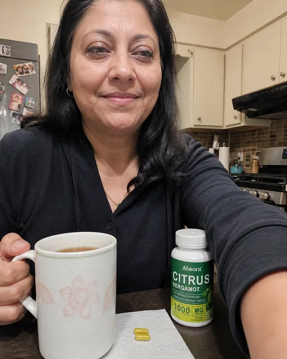 Woman sharing Citrus Bergamot from her kitchen